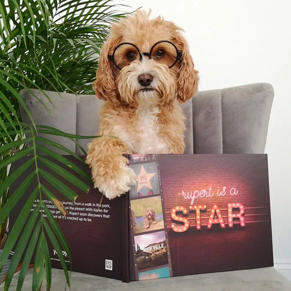 Rupert with his Personalised Dog's a Star book