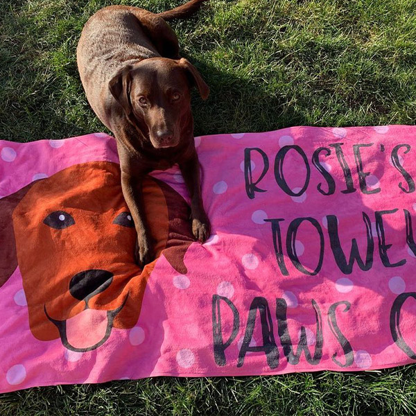 Rosie's personalised Dog towel in the garden